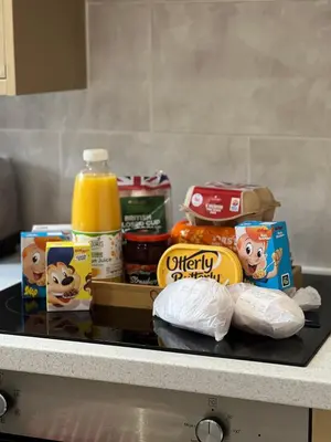a counter with food and other food items on it at Winter Gardens Large Flat 1 in Blackpool