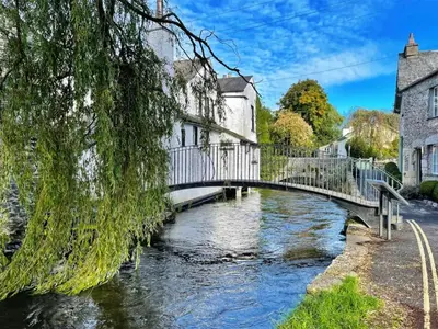 a bridge over a river in a small town at Uk46867 - Thirlmere in Ulverston