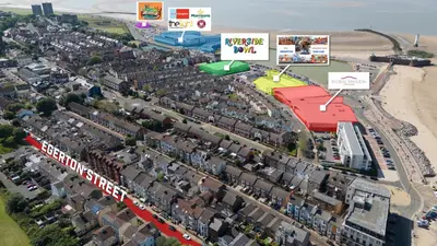 an overhead view of a city with buildings and a beach at Red & Blue flat 15mins to Liverpool city centre, free parking in New Brighton