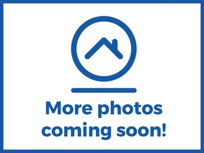 a sign that says more photos coming soon at Wayside Lodge in Blackpool