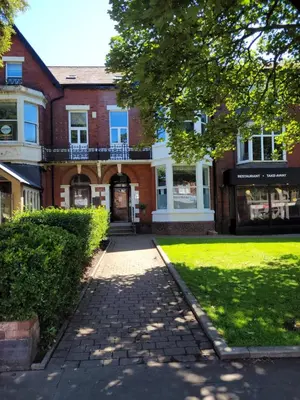 a brick building with a walkway in front of it at Lytham St Annes Luxury Apartment - No 1 Tides Reach in Lytham St Annes