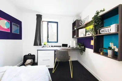 a bedroom with a desk with a laptop on it at Student Only Ensuite at Prospect Point Liverpool in Liverpool