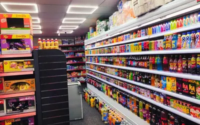 a store aisle filled with lots of toy items at Lodginet Stays - County Cosy - 1BR Flat 2 in Liverpool