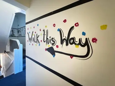 a room with a wall with the words walk this way on it at Bold Street Studio V in Liverpool