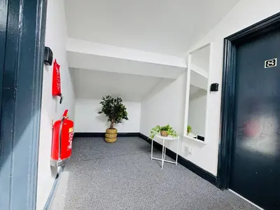 an empty room with a fire hydrant and a door at Pembroke Place Private Room 5B in Liverpool