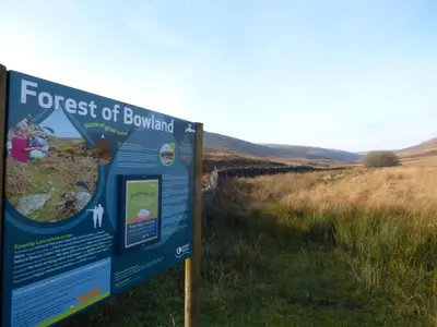 a sign for the forest of bowland in a field at Boavista in Carnforth
