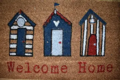 a towel with three stained glass windows on it at Redwood House in Liverpool