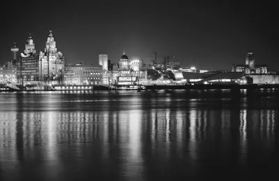a black and white photo of a city at night at Comfortable Liverpool Townhouse - Close to City & Stadium in Liverpool