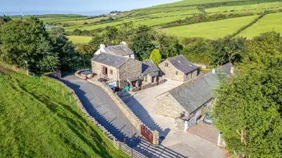 an aerial view of a house in a field at Oak Lodge in Ulverston