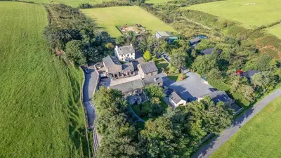 an aerial view of a large house in a field at Oak Lodge in Ulverston