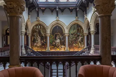 a room with a painting on the wall at The Mary Maude Suite Stone Cross Mansion in Ulverston