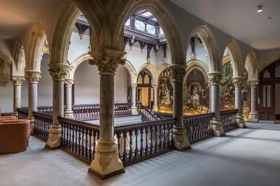 an ornate building with columns and arches at The Violet Suite Stone Cross Mansion in Ulverston
