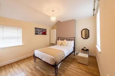 a bedroom with a bed and a window at The Chestnut - Liverpool City - L7 in Liverpool
