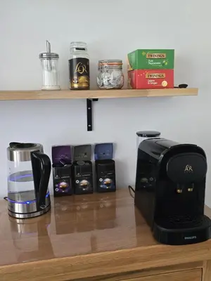 a kitchen counter with a coffee maker and a toaster at Victorian Renovation Room 3 in Liverpool