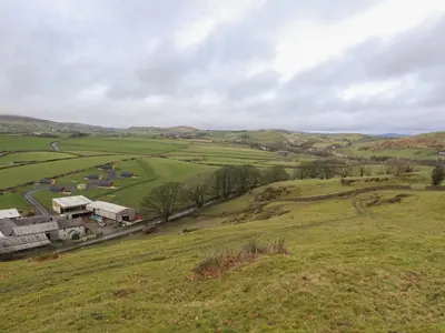 an aerial view of a farm in a field at Oak in Ulverston